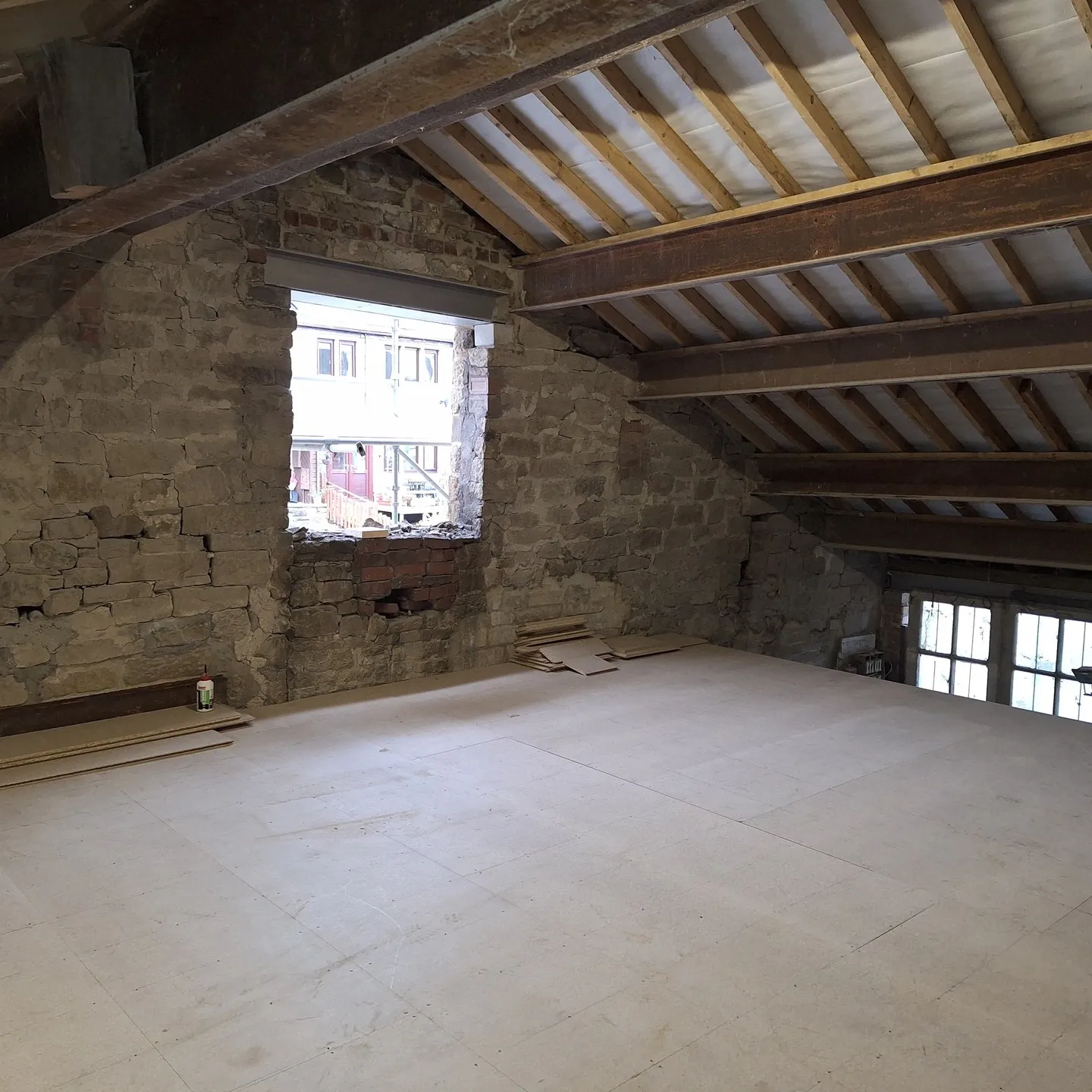 The new mezzanine floor upstairs under the pitched roof