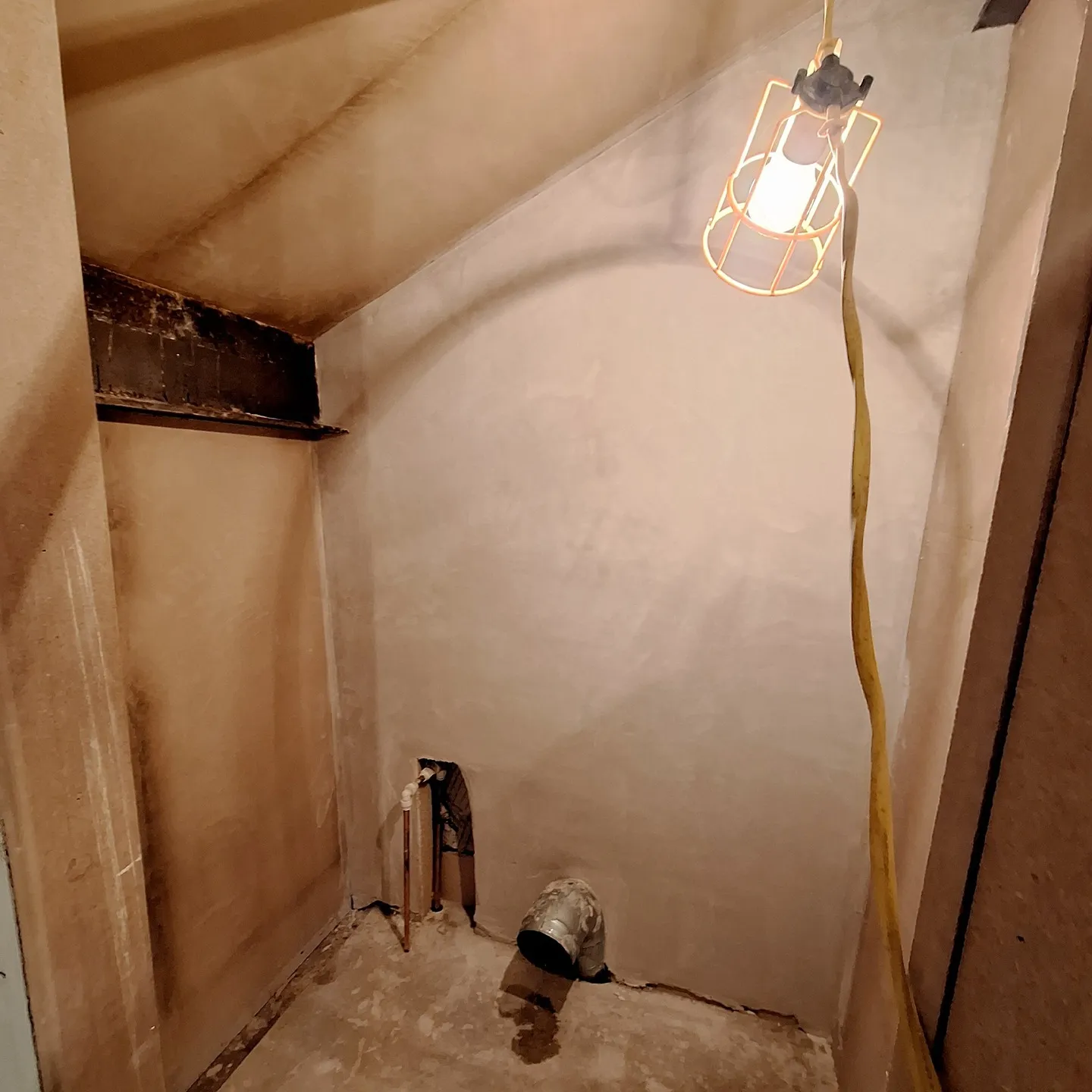 The utility cupboard during the build, before it was hidden behind acoustic slats